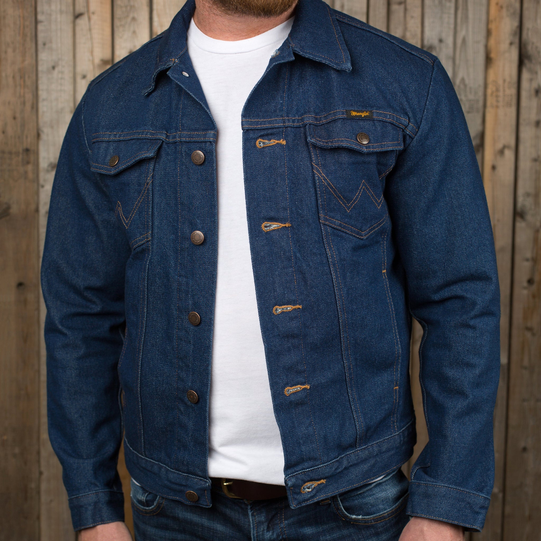 Front view of a man wearing a Wrangler Denim Jacket