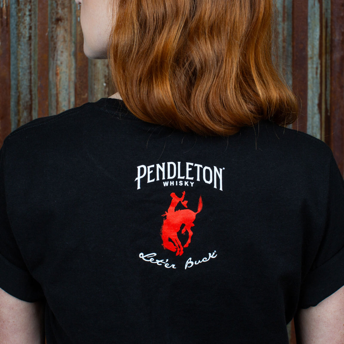Rear view of black Pendleton® Whisky Military Edition T-shirt on model