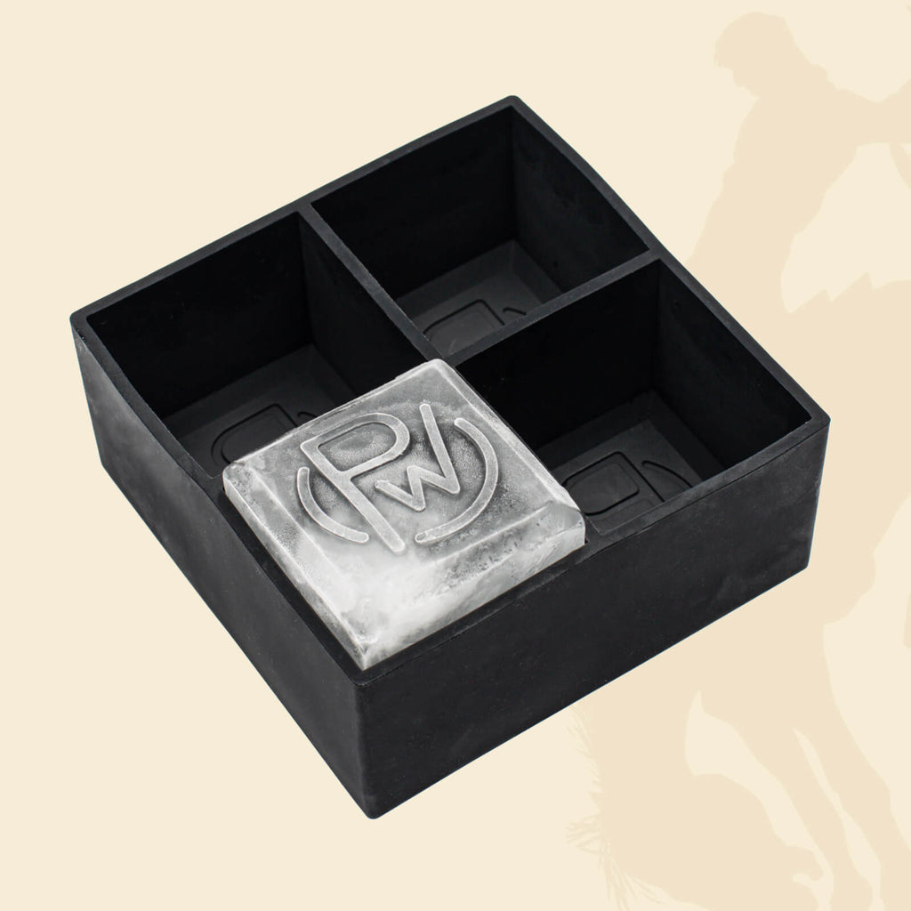 Isolated Pendleton® Whisky Logo Ice Tray depicting logo details on the bottom surface of the tray with ice cube in lower left corner of the tray