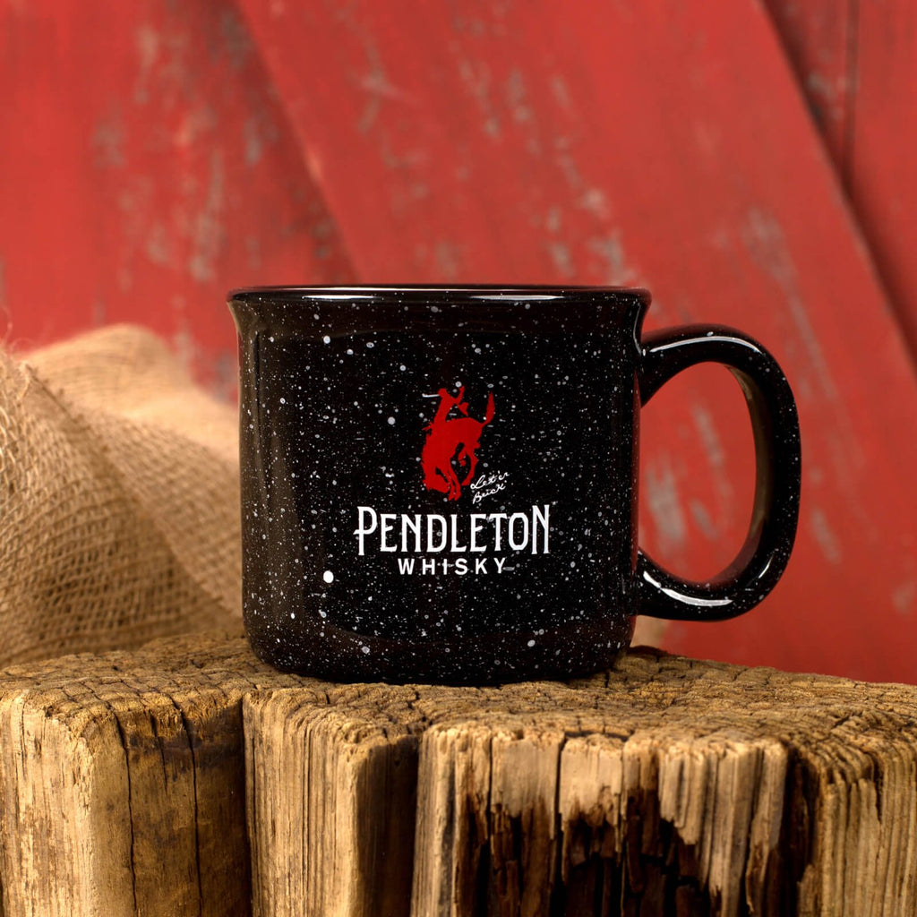 Pendleton® Whisky Ceramic Camp Mug on wooden surface