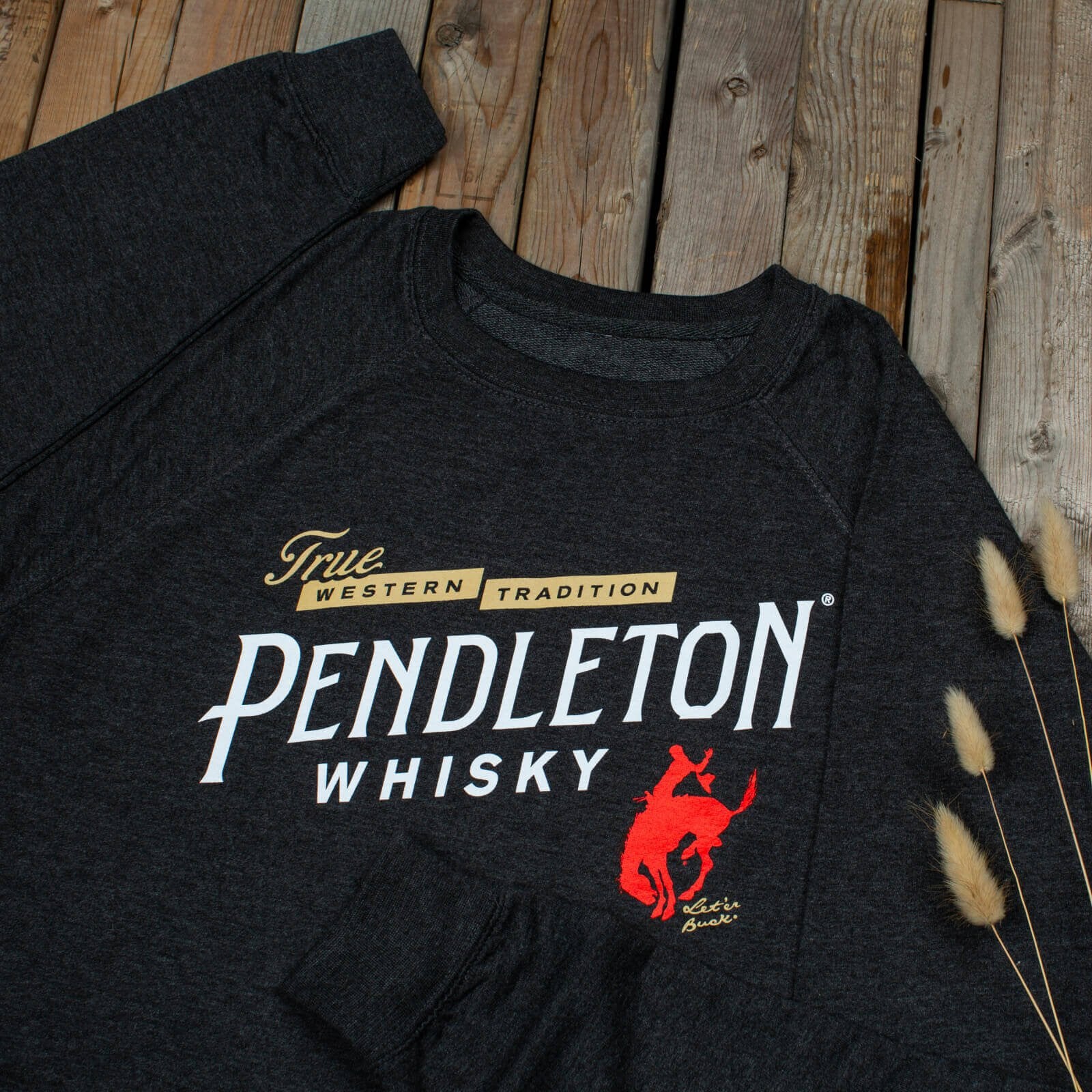 Pendleton® Whisky True Western Tradition Crewneck on wooden surface