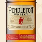 Each Pendleton Whisky Original bottle prominently features the rodeo’s famous bucking horse symbol and Let’er Buck slogan